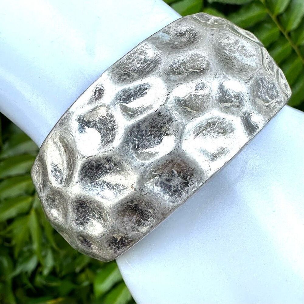Silver tone bangle hinged bracelet